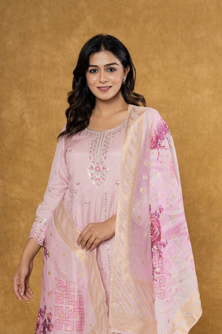 Elevate Your Festive Look: Soft Pink Muslin Anarkali Suit Set with Intricate Embroidery - Nakh Clothing