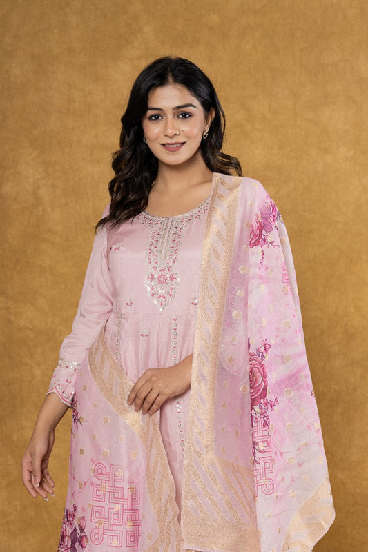 Elevate Your Festive Look: Soft Pink Muslin Anarkali Suit Set with Intricate Embroidery - Nakh Clothing
