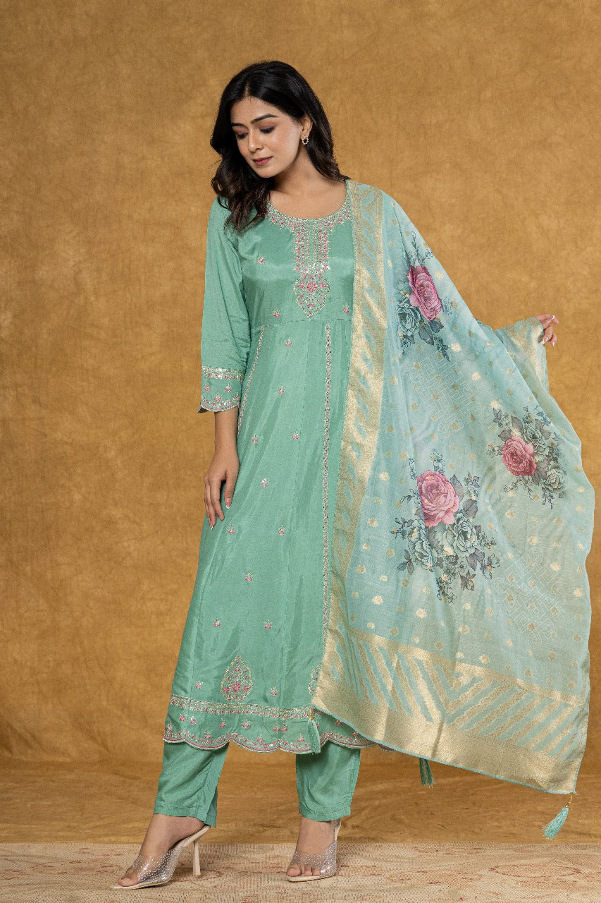 Elevate Your Festive Look: Pastel Green Muslin Anarkali Suit Set with Intricate Embroidery - Nakh Clothing
