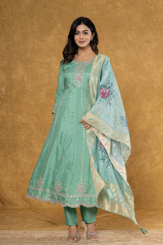 Elevate Your Festive Look: Pastel Green Muslin Anarkali Suit Set with Intricate Embroidery - Nakh Clothing