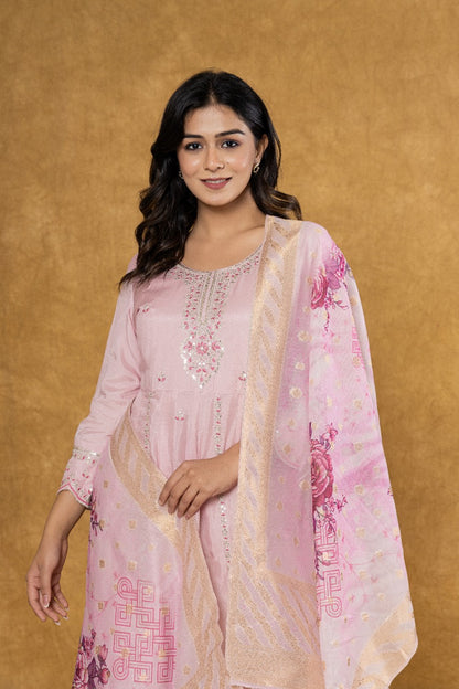 Elevate Your Festive Look: Soft Pink Muslin Anarkali Suit Set with Intricate Embroidery