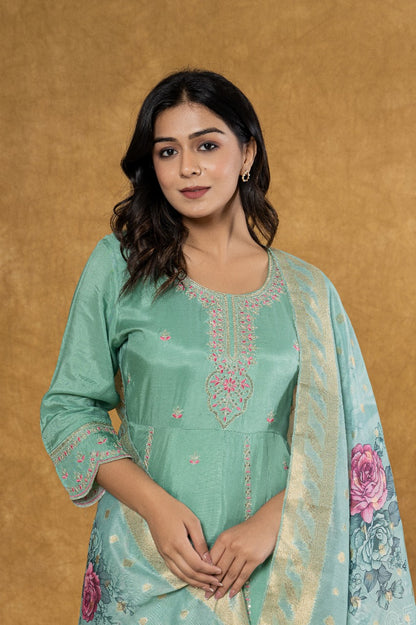 Elevate Your Festive Look: Pastel Green Muslin Anarkali Suit Set with Intricate Embroidery